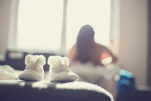 young mother with her newborn baby