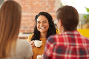 Three people having coffee